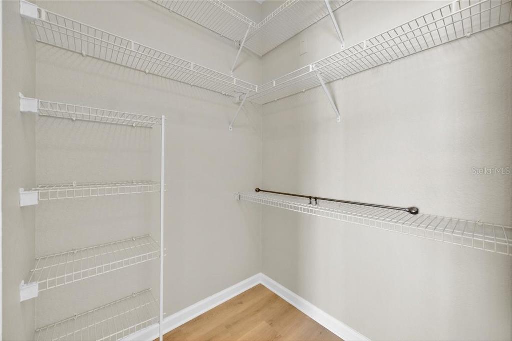 13524 Turtle Marsh Loop, Unit 621 Orlando, FL 32837 - Photo 18 of 26 a view of small space with racks on the wall