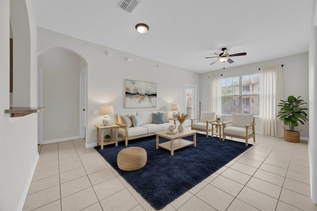 13524 Turtle Marsh Loop, Unit 621 Orlando, FL 32837 - Photo 5 of 26 a living room with furniture