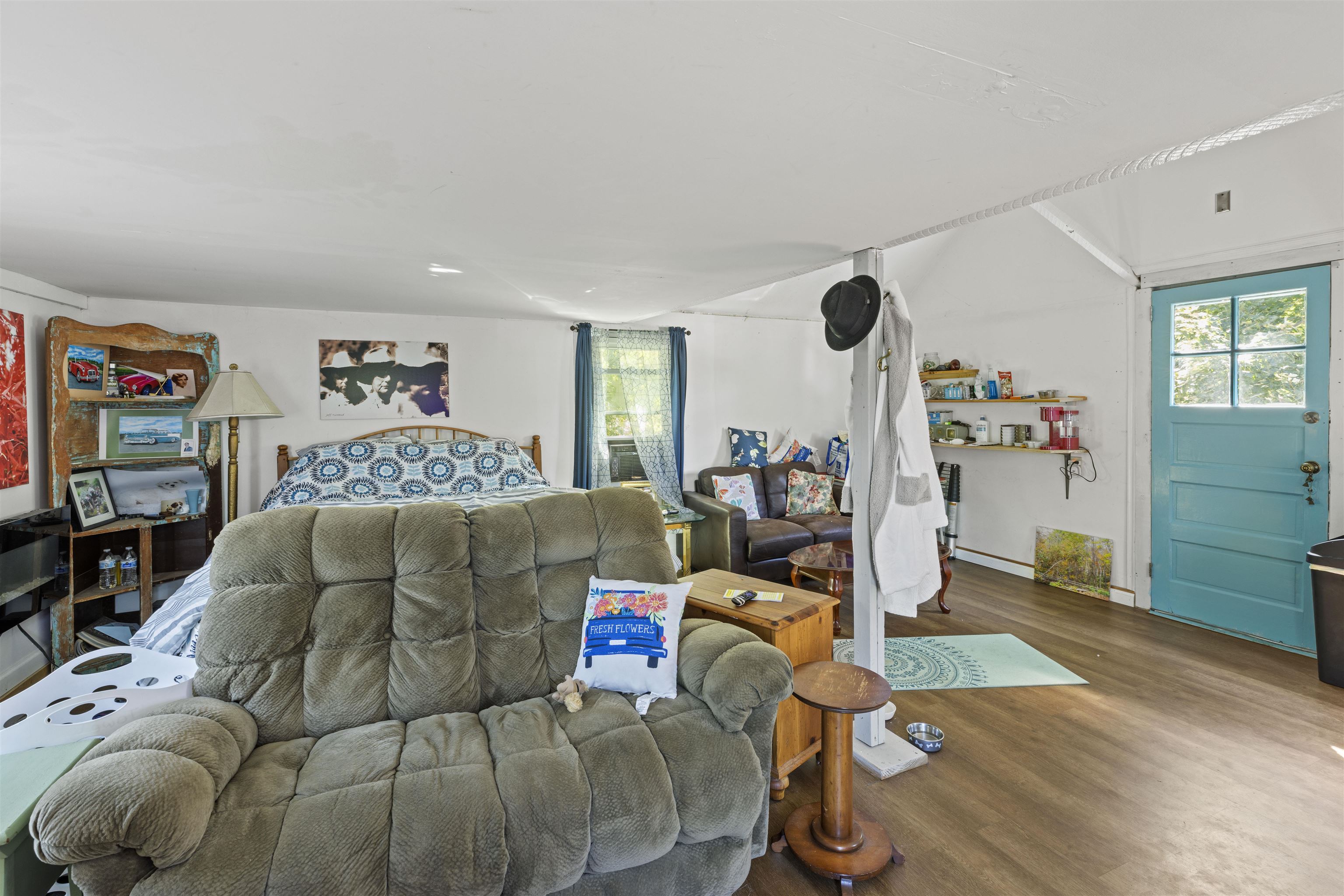 35 Bay Shore Road Cape May, NJ 08204 - Photo 11 of 45 a living room with furniture and a flat screen tv