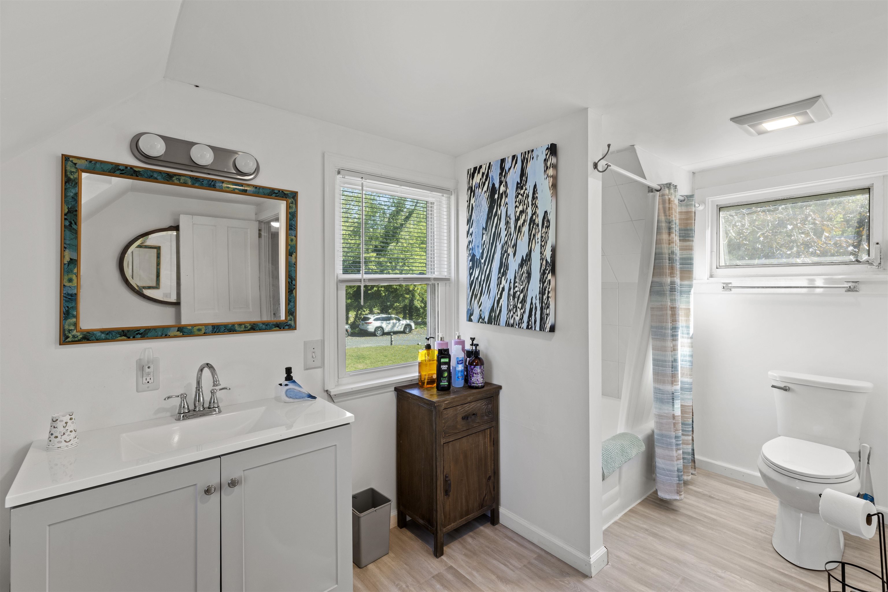 35 Bay Shore Road Cape May, NJ 08204 - Photo 19 of 45 a bathroom with a sink a toilet and a mirror