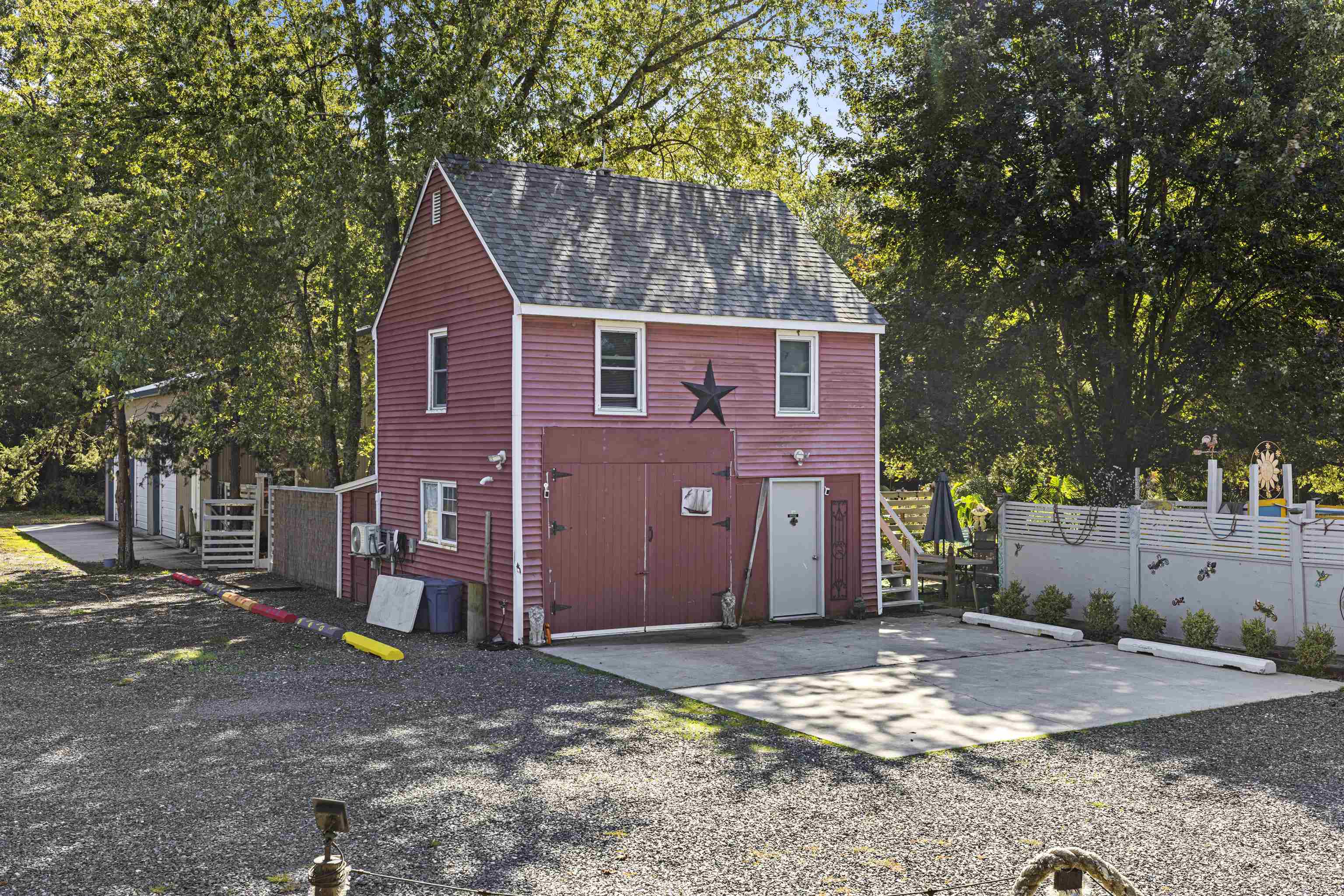 35 Bay Shore Road Cape May, NJ 08204 - Photo 27 of 45 a view of a house with a yard