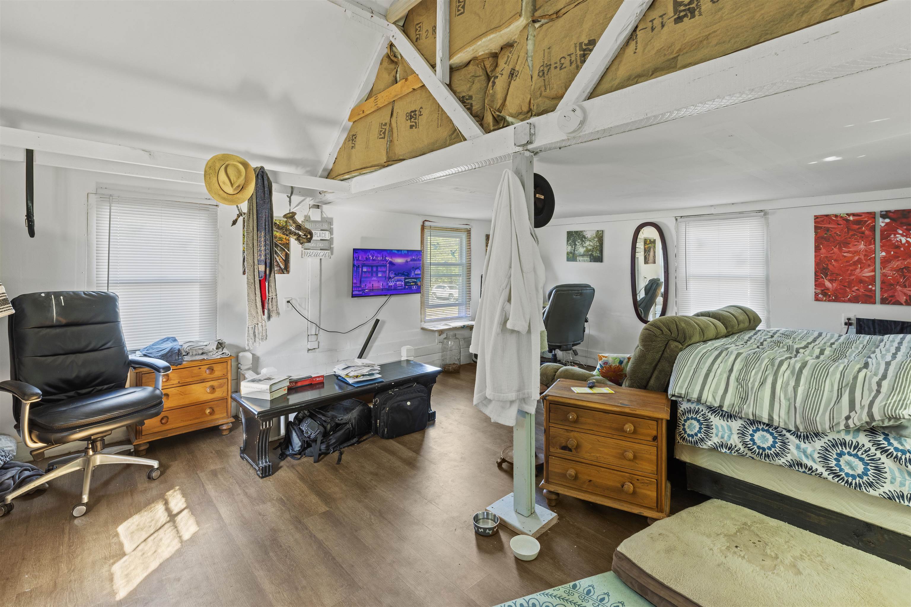 35 Bay Shore Road Cape May, NJ 08204 - Photo 31 of 45 a bedroom with furniture and a wooden floor