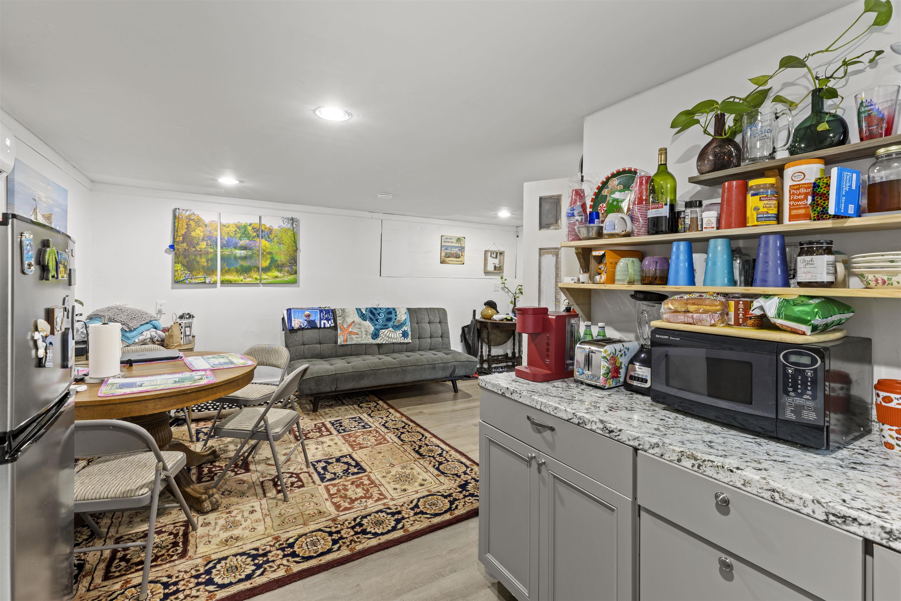 35 Bay Shore Road Cape May, NJ 08204 - Photo 32 of 45 a living room with furniture window and book shelf