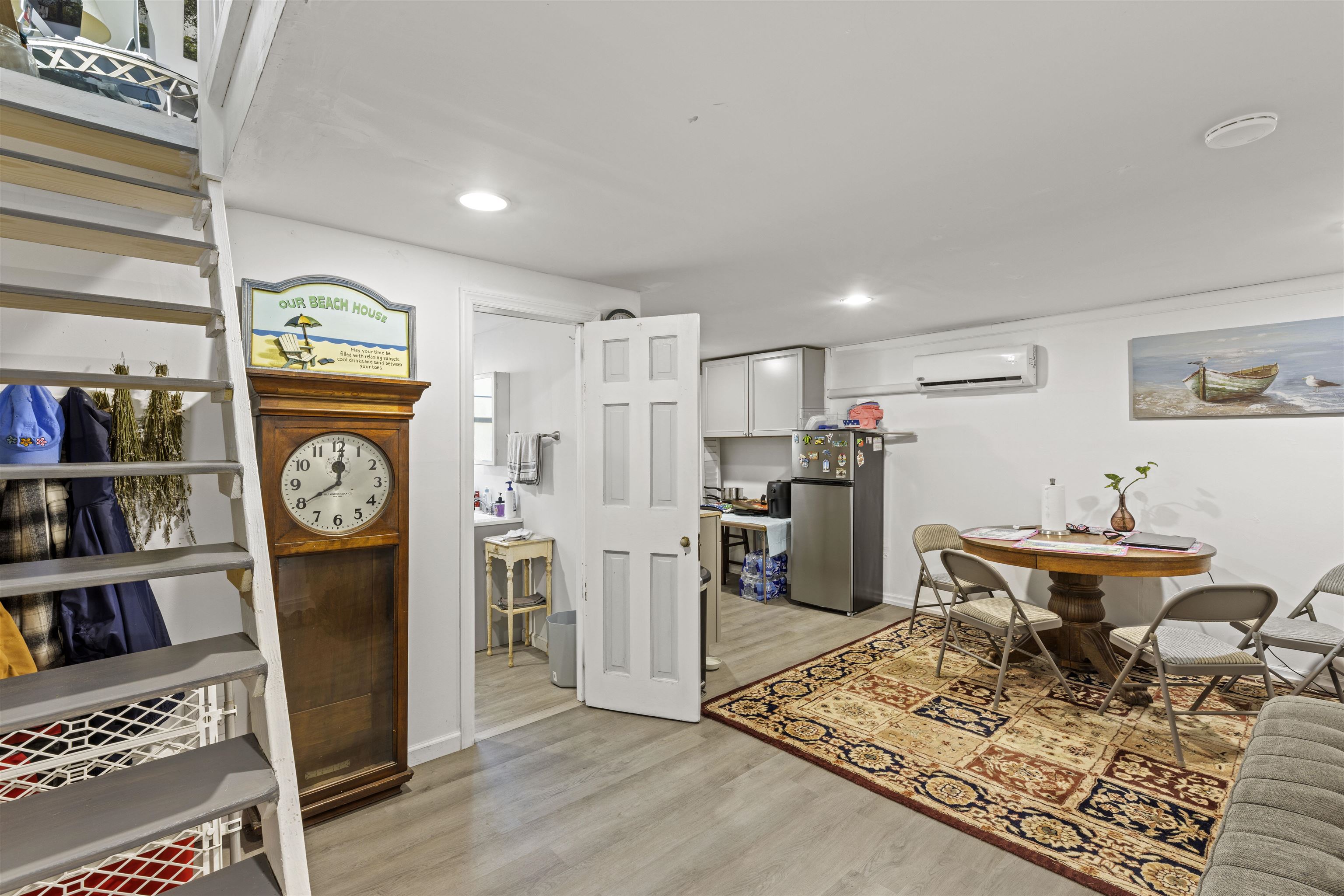 35 Bay Shore Road Cape May, NJ 08204 - Photo 33 of 45 a living room with furniture and a table