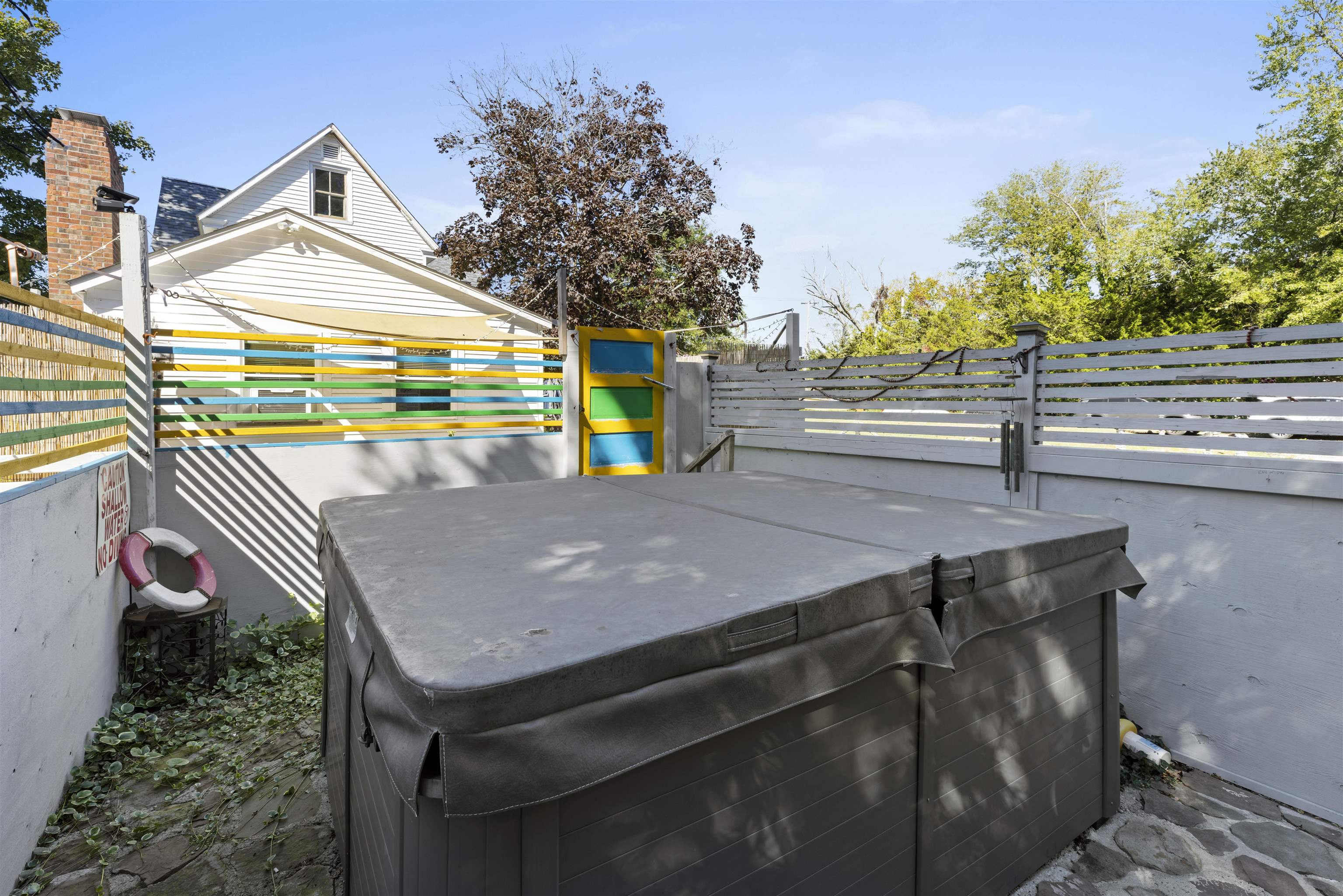 35 Bay Shore Road Cape May, NJ 08204 - Photo 38 of 45 a view of a patio with a table and chairs