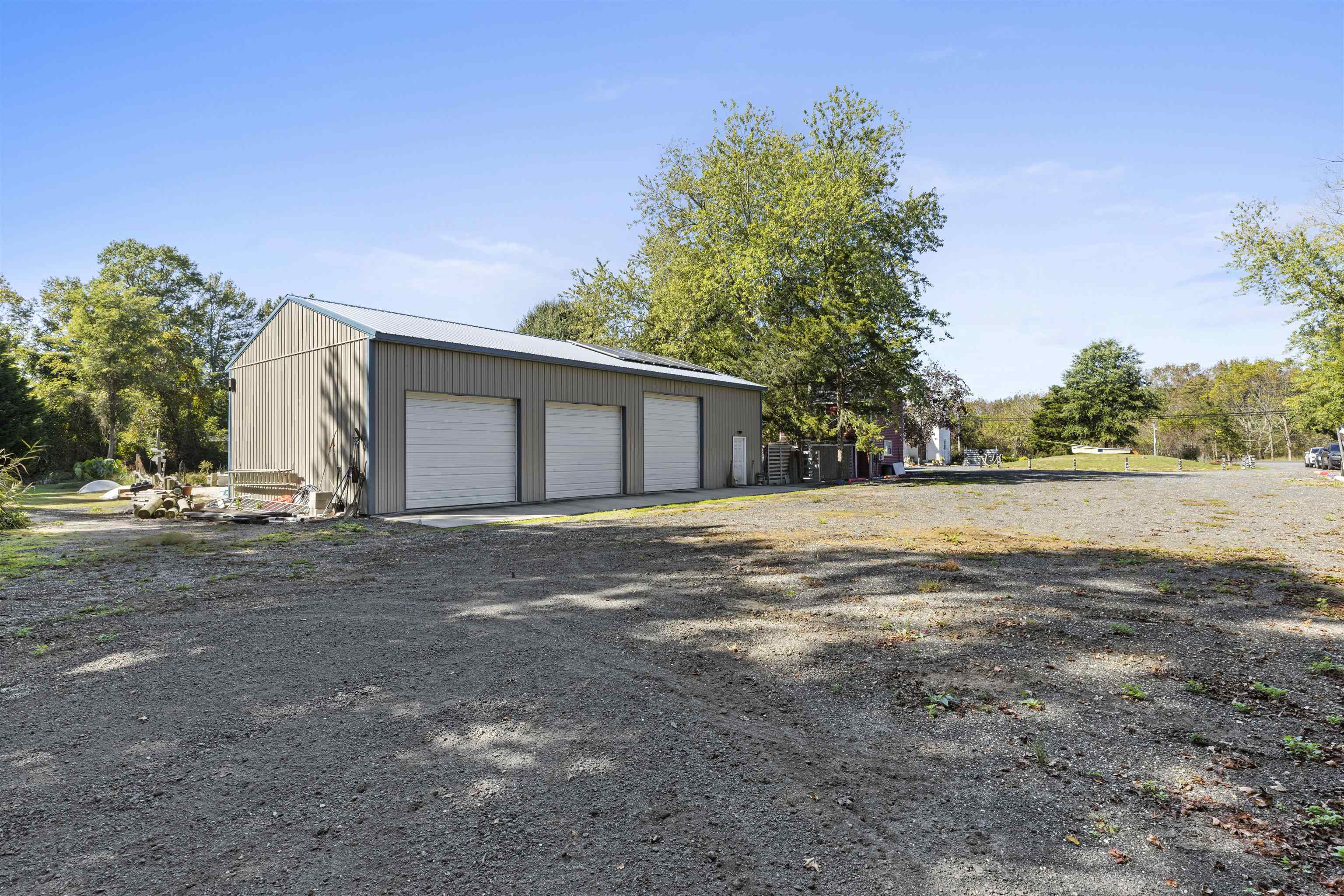 35 Bay Shore Road Cape May, NJ 08204 - Photo 41 of 45 a view of house with backyard and trees