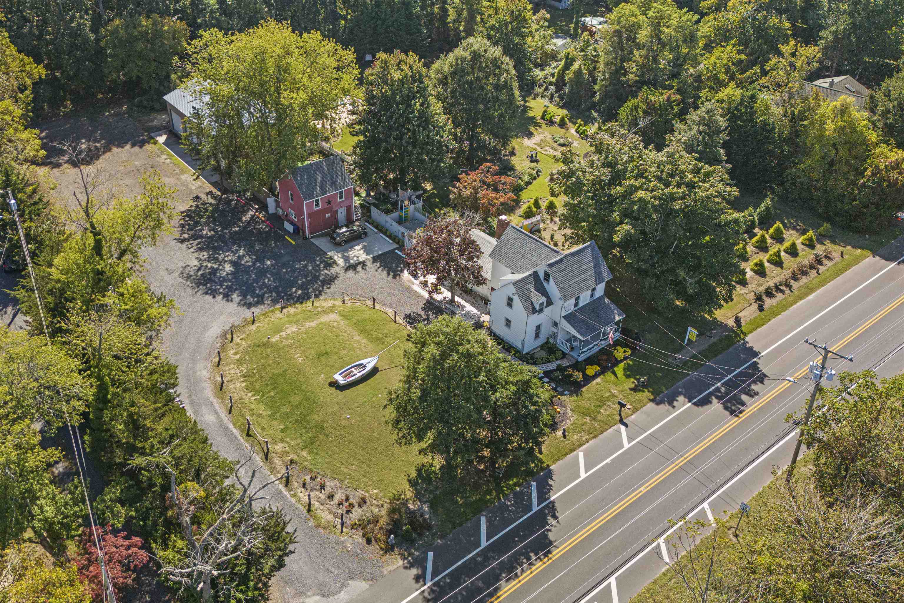 35 Bay Shore Road Cape May, NJ 08204 - Photo 42 of 45 an aerial view of a house with a garden and swimming pool