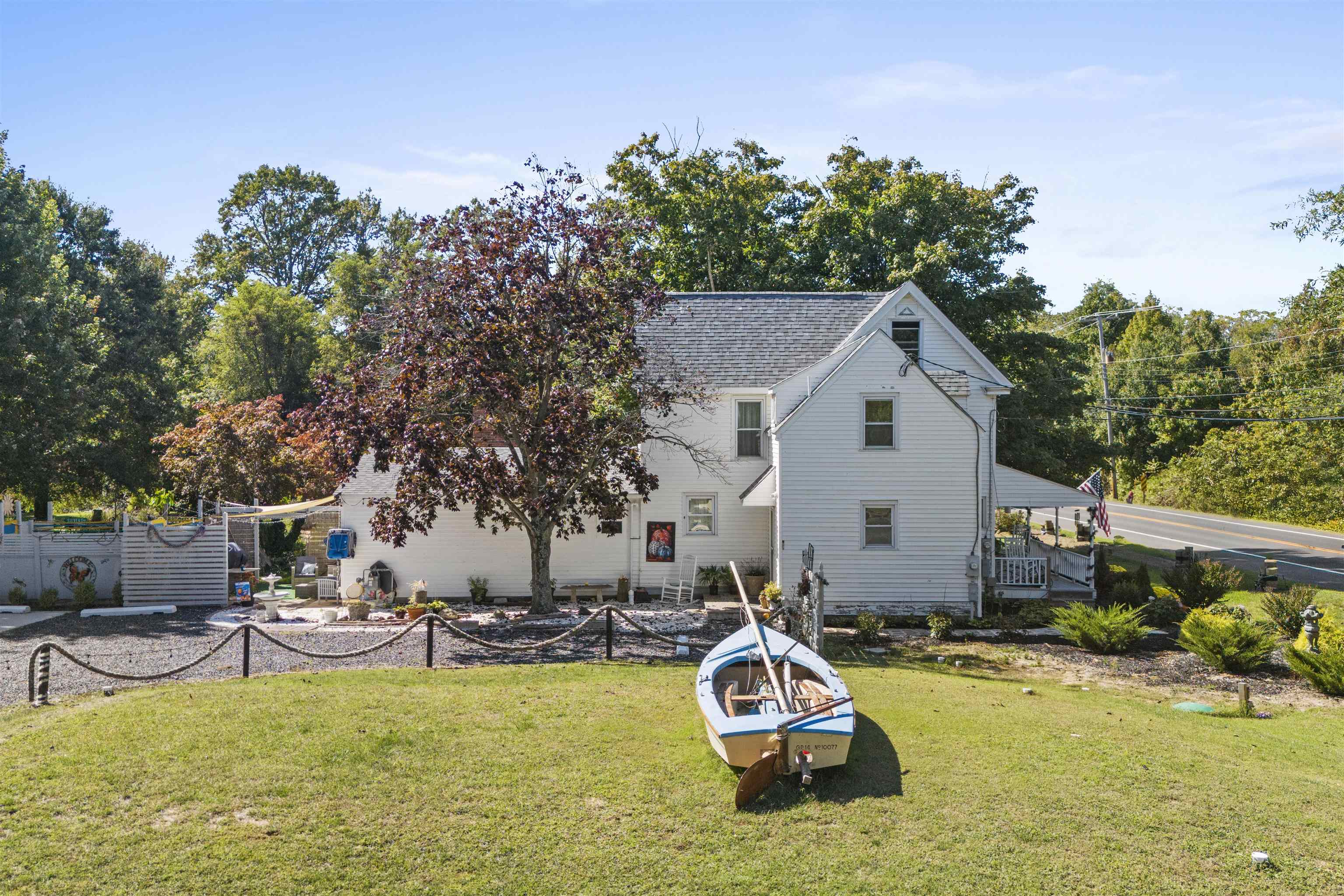 35 Bay Shore Road Cape May, NJ 08204 - Photo 5 of 45 a view of a house with swimming pool and sitting area