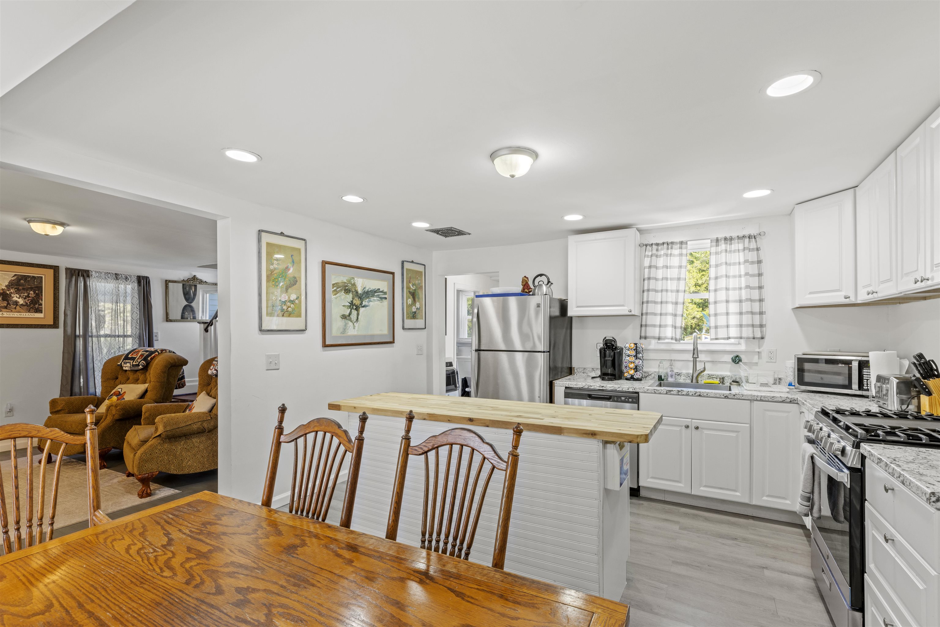 35 Bay Shore Road Cape May, NJ 08204 - Photo 8 of 45 a kitchen with stainless steel appliances kitchen island granite countertop a sink and cabinets
