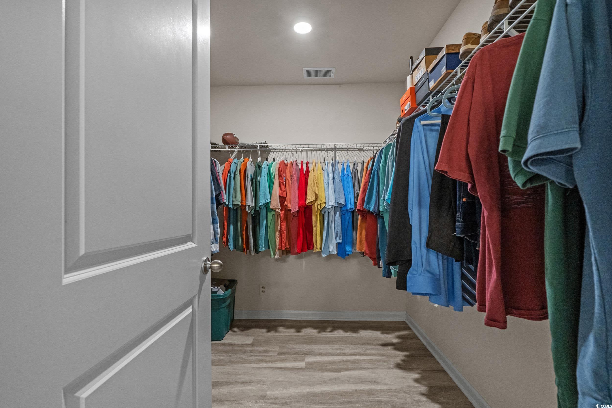 1803 Promise Pl. Myrtle Beach, SC 29588 - Photo 24 of 40 Walk in closet with light wood-type flooring