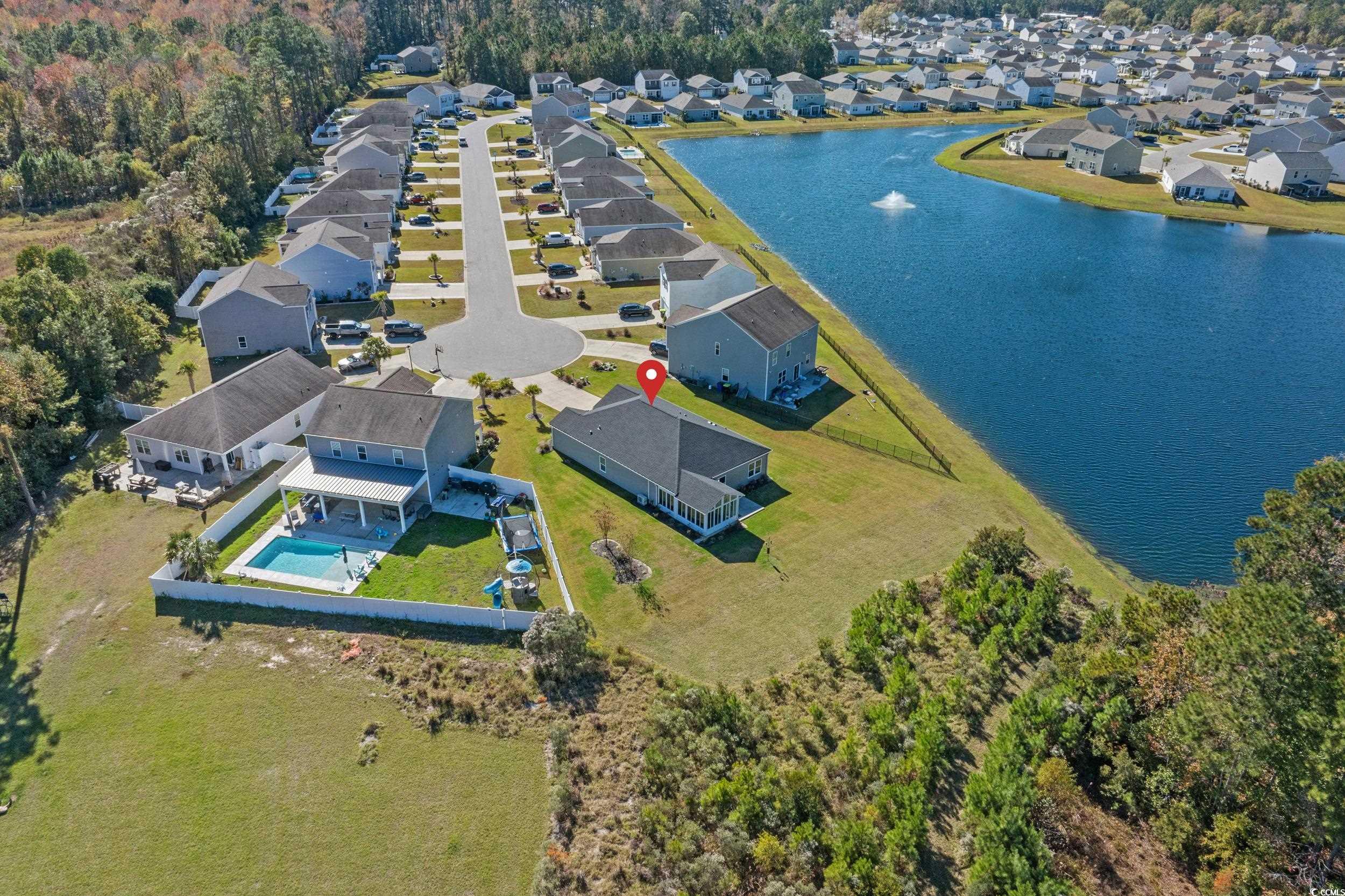 1803 Promise Pl. Myrtle Beach, SC 29588 - Photo 3 of 40 Aerial view of residential area with a nearby body of water and a pool