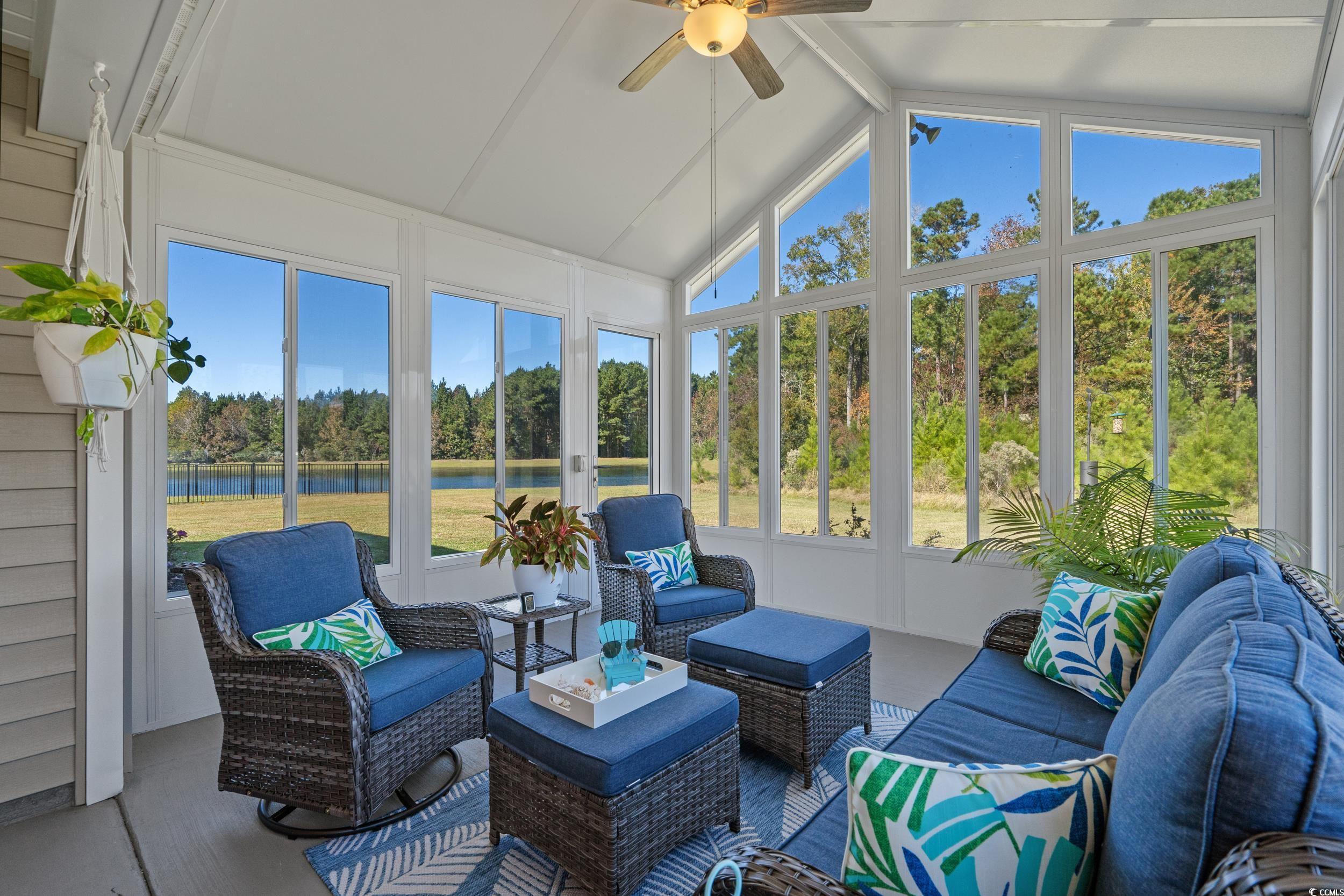1803 Promise Pl. Myrtle Beach, SC 29588 - Photo 33 of 40 Sunroom with ceiling fan, plenty of natural light, and a water view