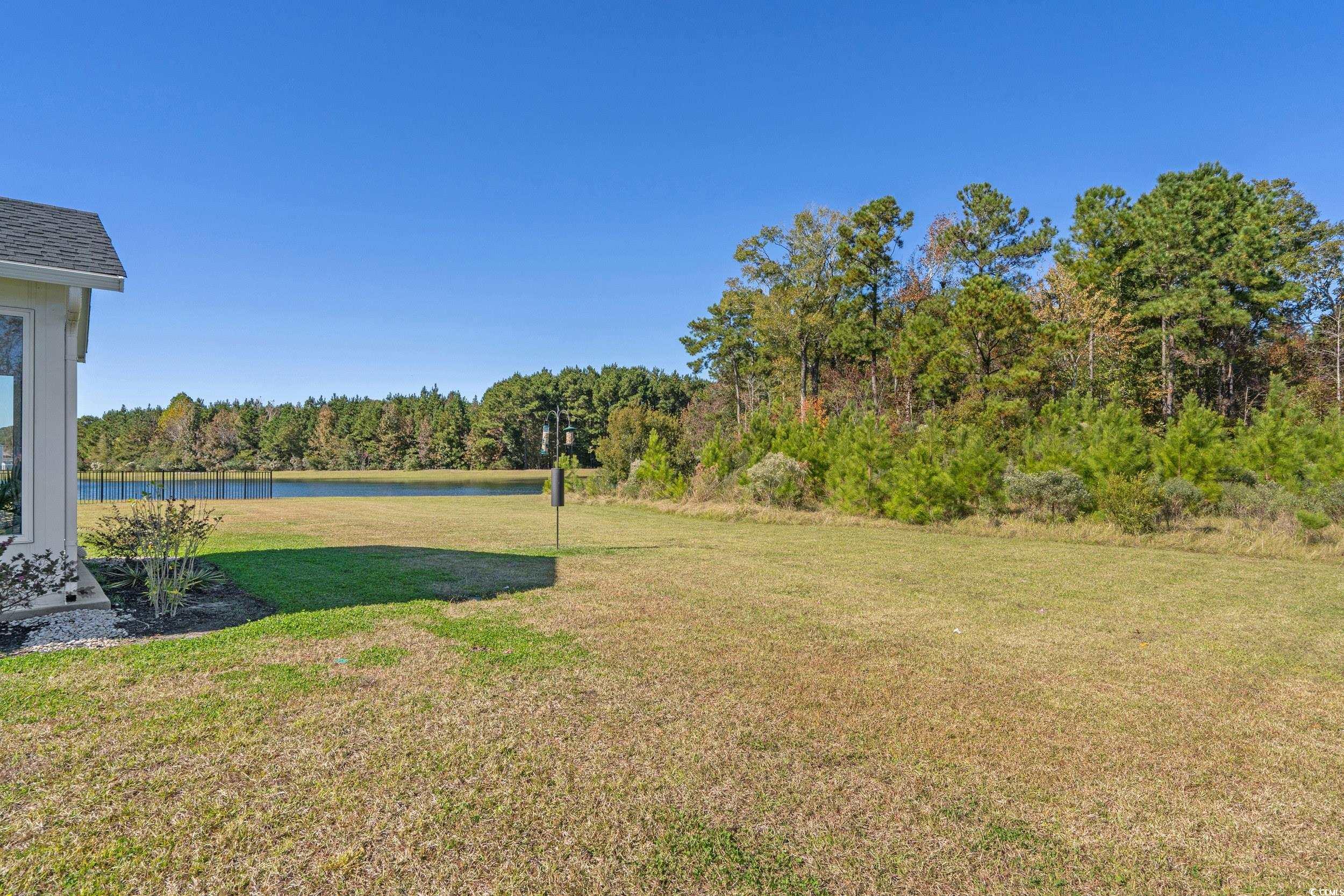1803 Promise Pl. Myrtle Beach, SC 29588 - Photo 36 of 40 View of grassy yard featuring a water view