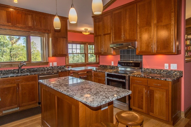1075 Old Greenville Road Staunton, VA 24401 - Photo 21 of 50 a kitchen with stainless steel appliances granite countertop a stove a sink and a microwave