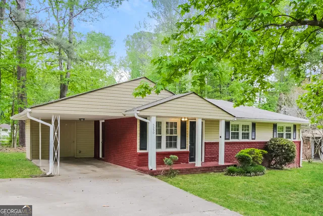 front view of a house with a yard
