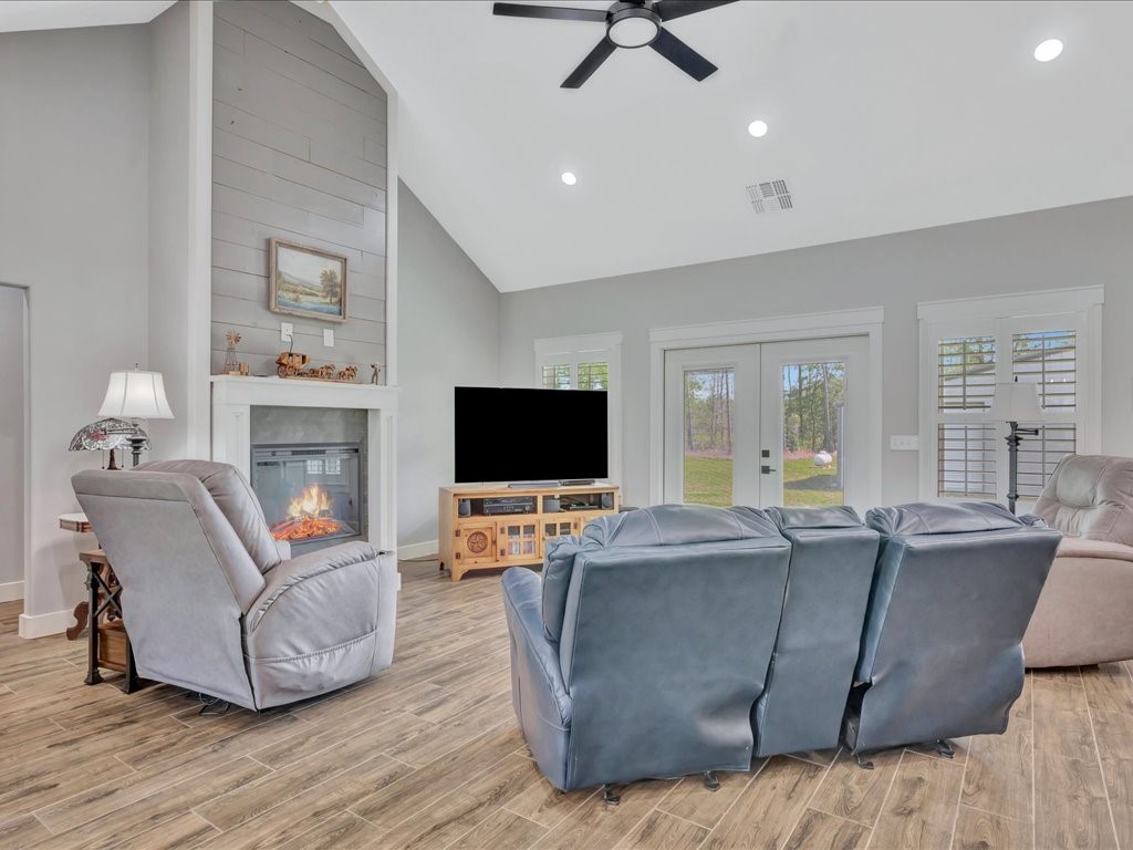 1105 C C Road Diboll, TX 75941 - Photo 13 of 40 a living room with furniture and a flat screen tv