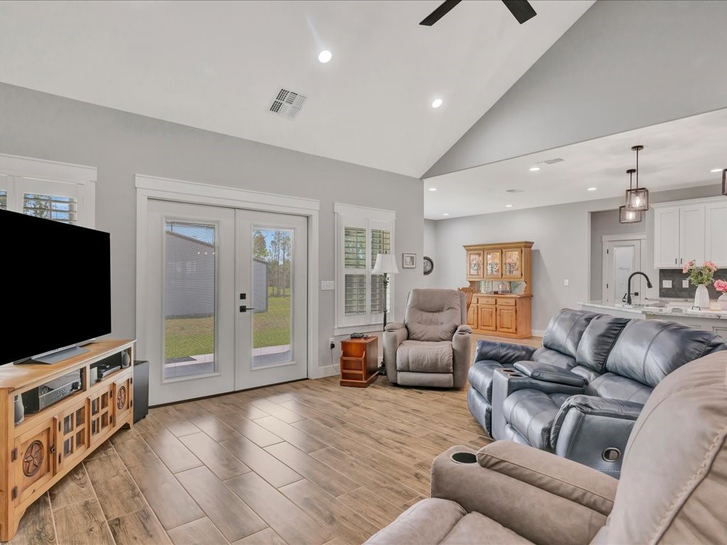 1105 C C Road Diboll, TX 75941 - Photo 15 of 40 a living room with furniture and a flat screen tv