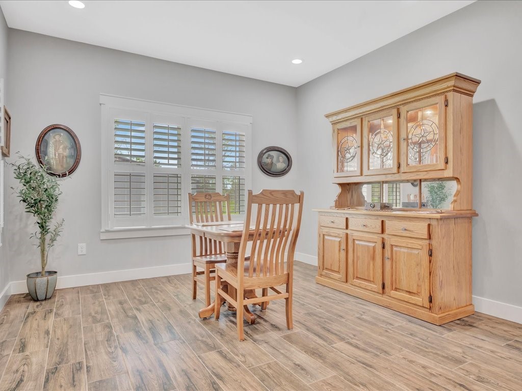 1105 C C Road Diboll, TX 75941 - Photo 18 of 40 a view of dining room and wooden floor