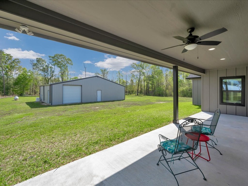 1105 C C Road Diboll, TX 75941 - Photo 32 of 40 a view of a porch with furniture and garden