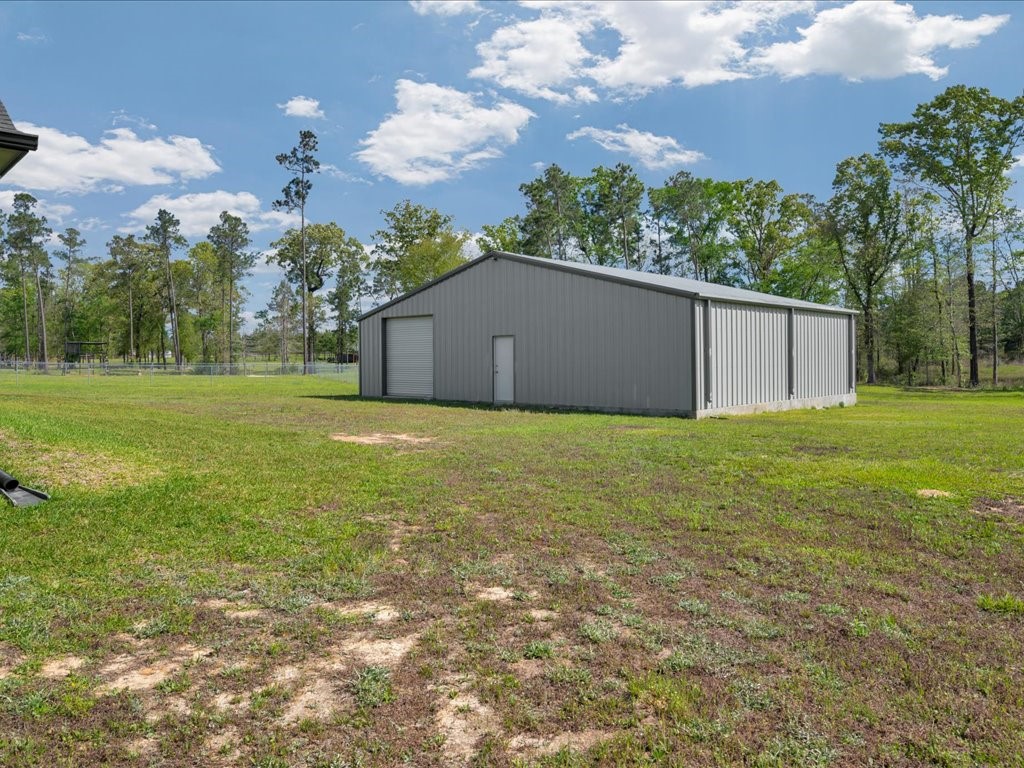 1105 C C Road Diboll, TX 75941 - Photo 33 of 40 a view of a backyard