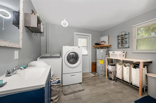a utility room with dryer and washer