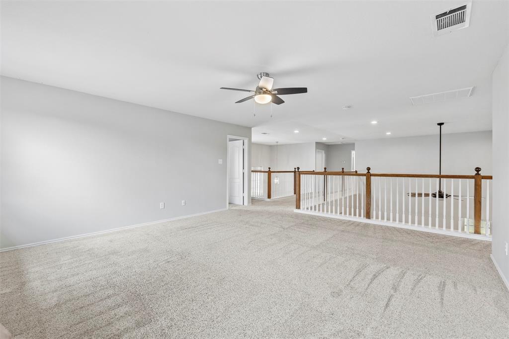 3931 Alpha Way Midlothian, TX 76065 - Photo 24 of 33 a view of a room with ceiling fan and window