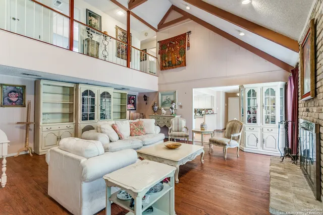 a living room with furniture and a table