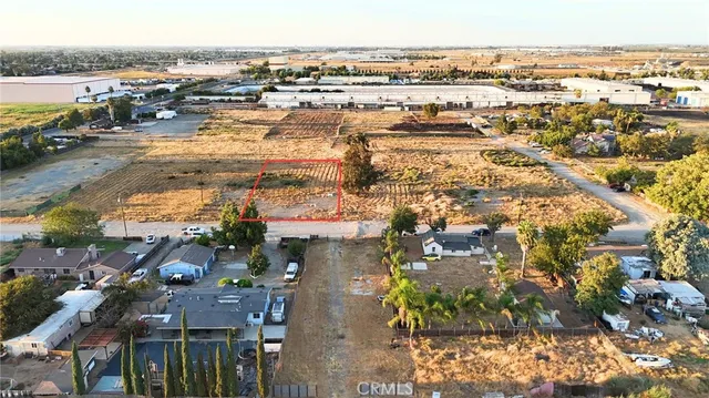an aerial view of residential building and ocean