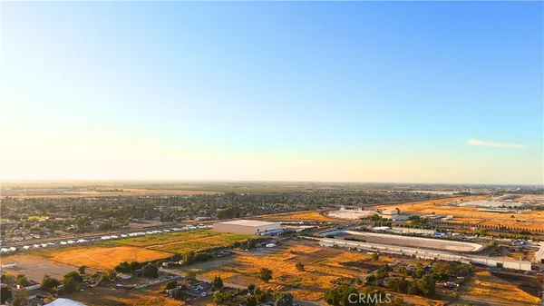 an aerial view of residential building with ocean view