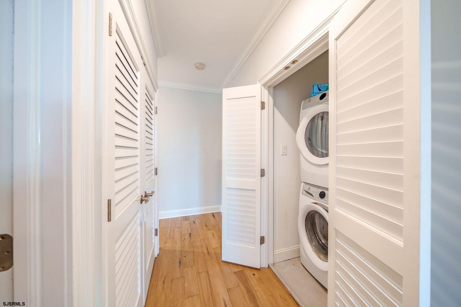 901 Wesley Avenue, Unit B Ocean City, NJ 08226 - Photo 13 of 33 a view of a hallway with washer and dryer