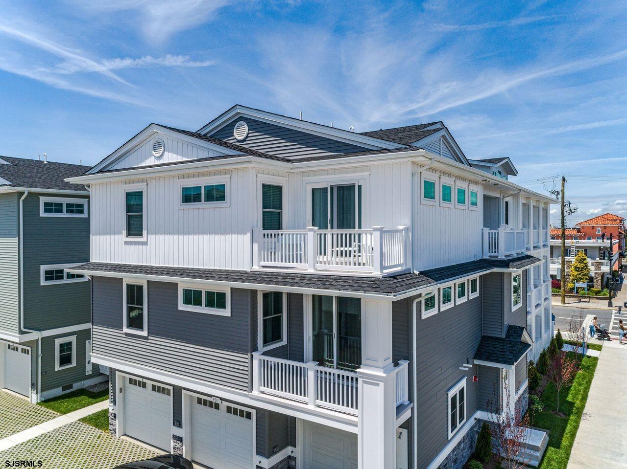 901 Wesley Avenue, Unit B Ocean City, NJ 08226 - Photo 26 of 33 a front view of a house with a yard