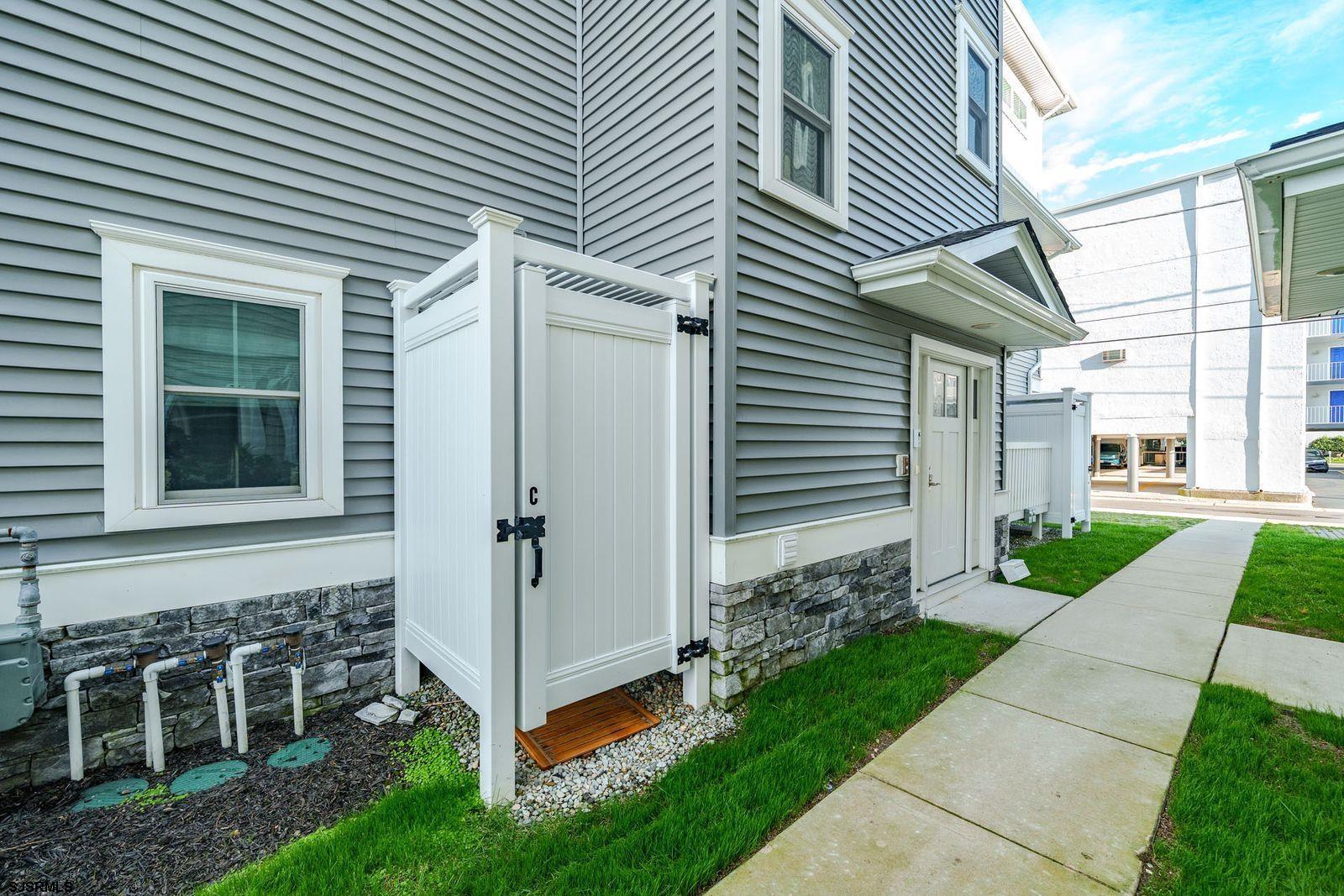 901 Wesley Avenue, Unit B Ocean City, NJ 08226 - Photo 28 of 33 a view of a house with a yard