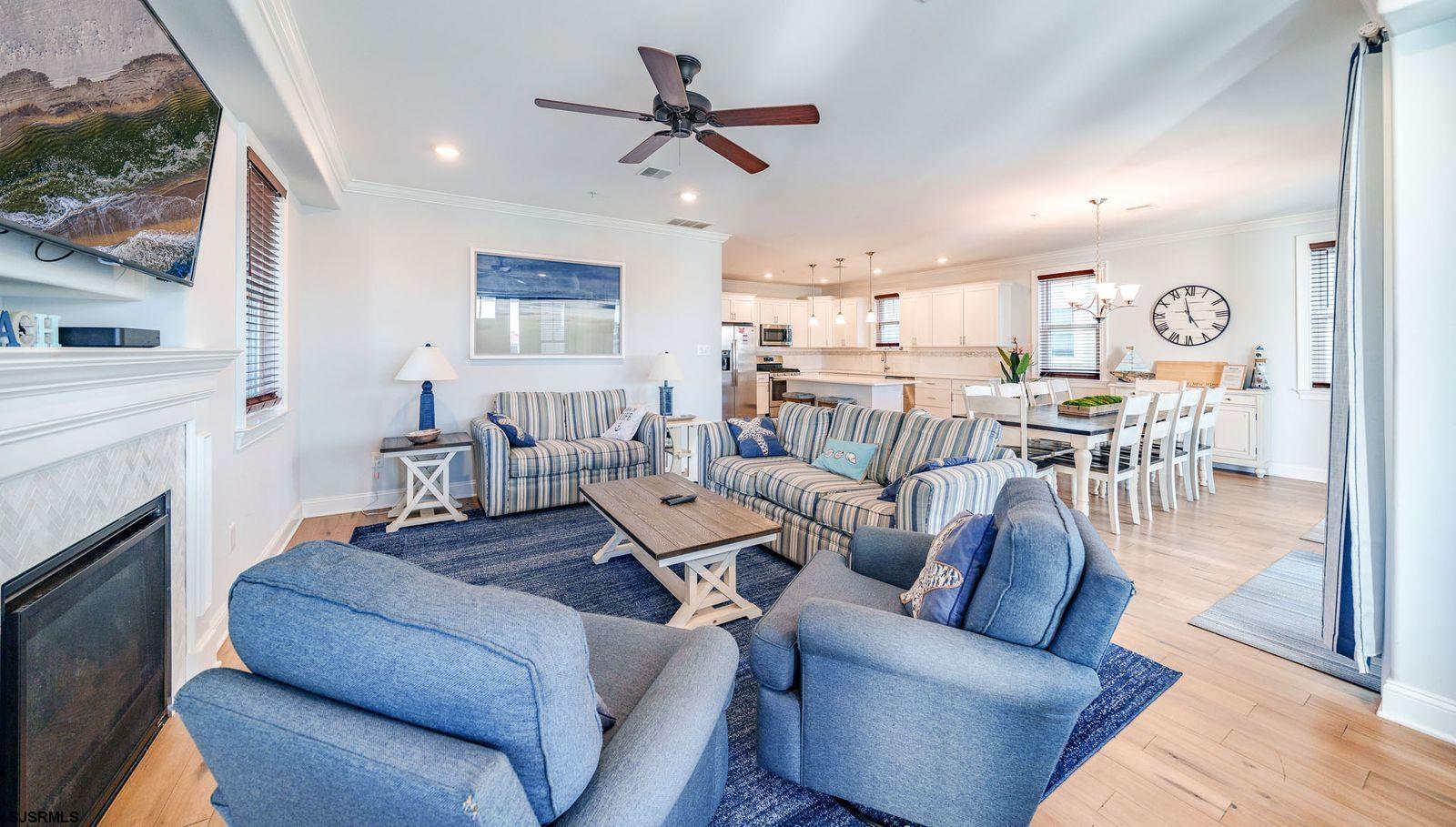 901 Wesley Avenue, Unit B Ocean City, NJ 08226 - Photo 7 of 33 a living room with furniture and a fireplace