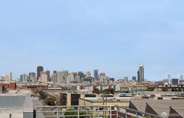 a view of a city with tall buildings in the background