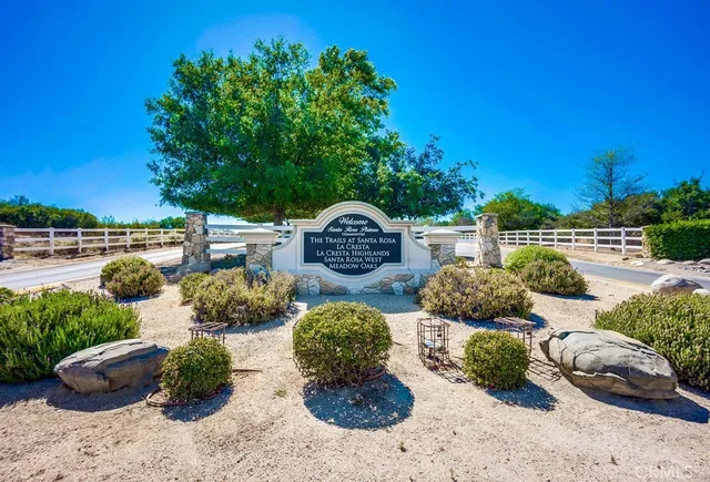a view of a garden and swimming pool