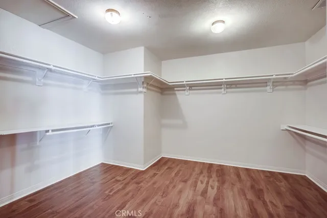 a view of an empty walk in closet