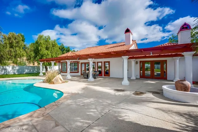 a front view of a house with entertaining space