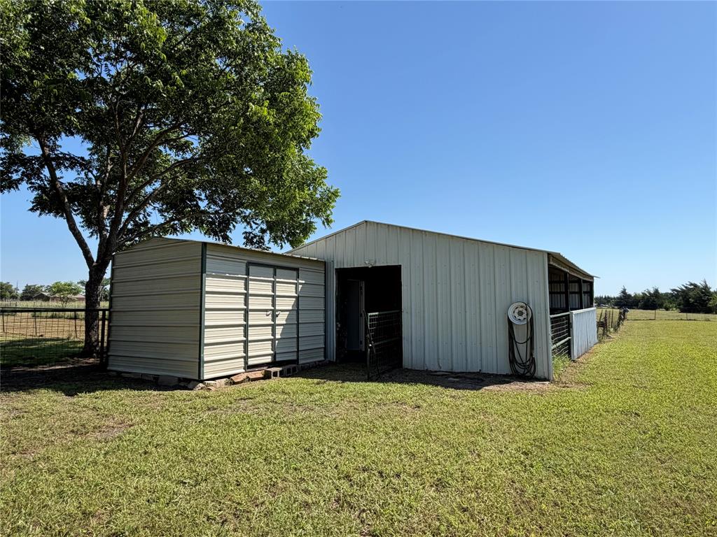 330 South Goode Road Wilmer, TX 75172 - Photo 37 of 38 a house with a outdoor space