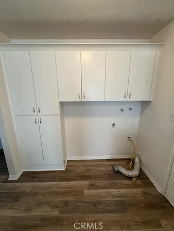 a view of room with hardwood floor