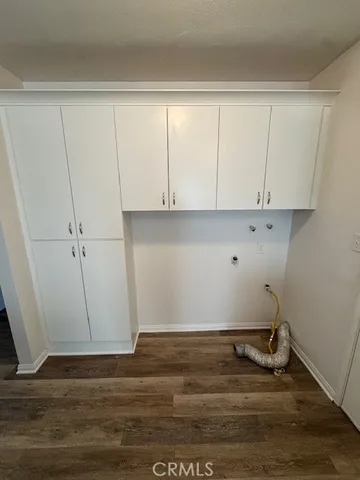 a view of room with hardwood floor