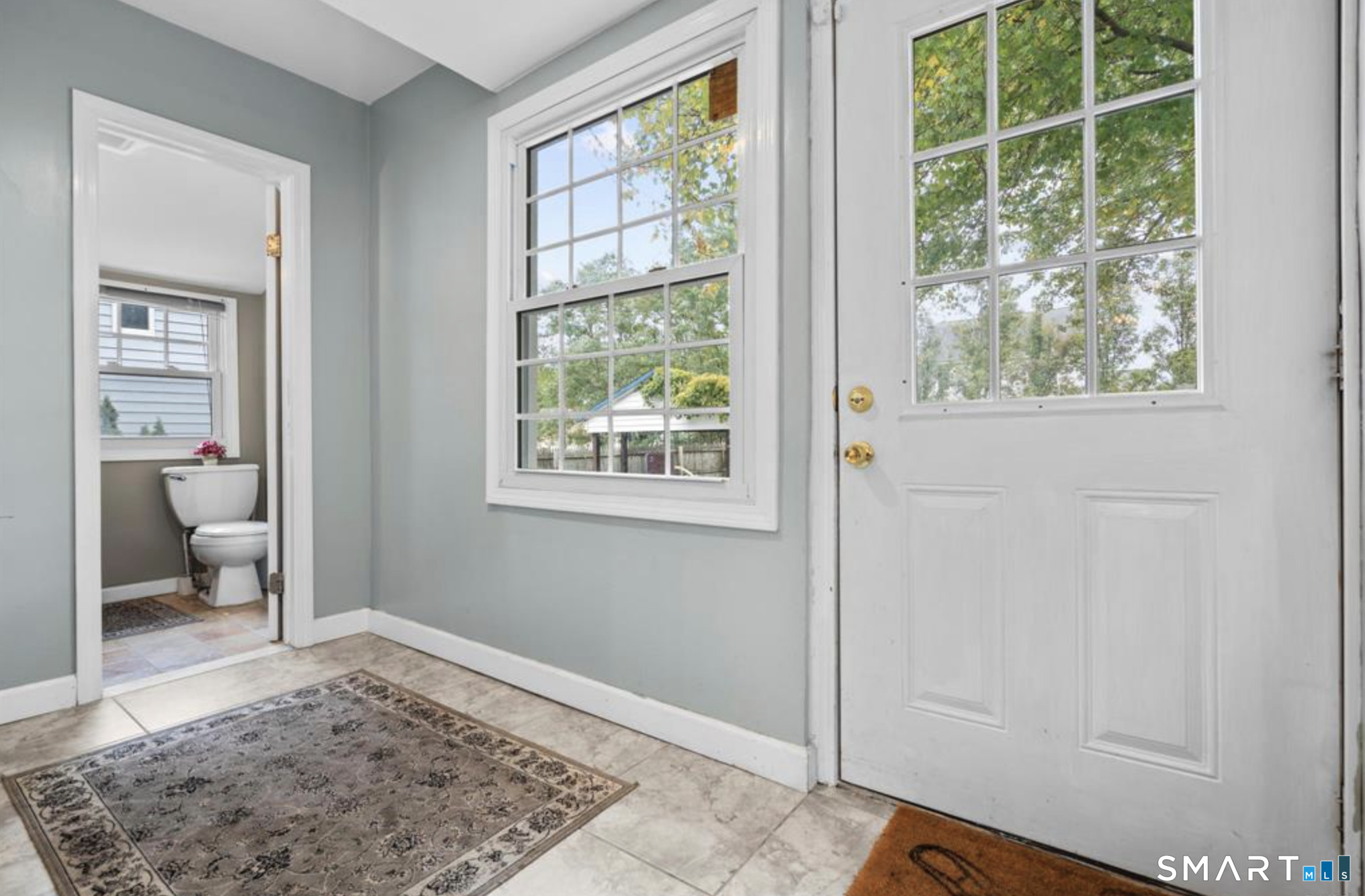 709 Tunxis Hill Road Fairfield, CT 06825 - Photo 10 of 37 mud room or office with half bath
