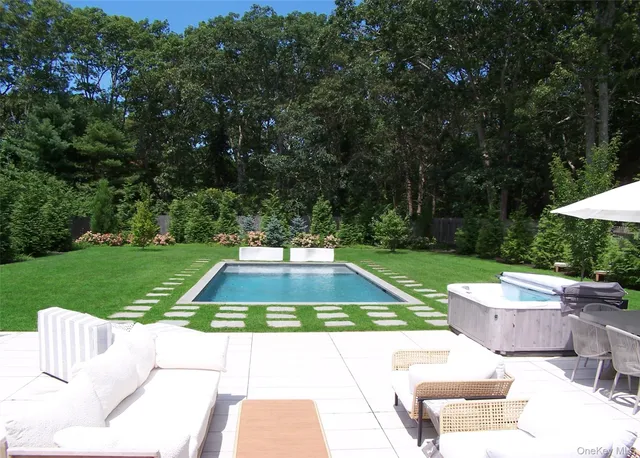 a view of a backyard with a garden and plants