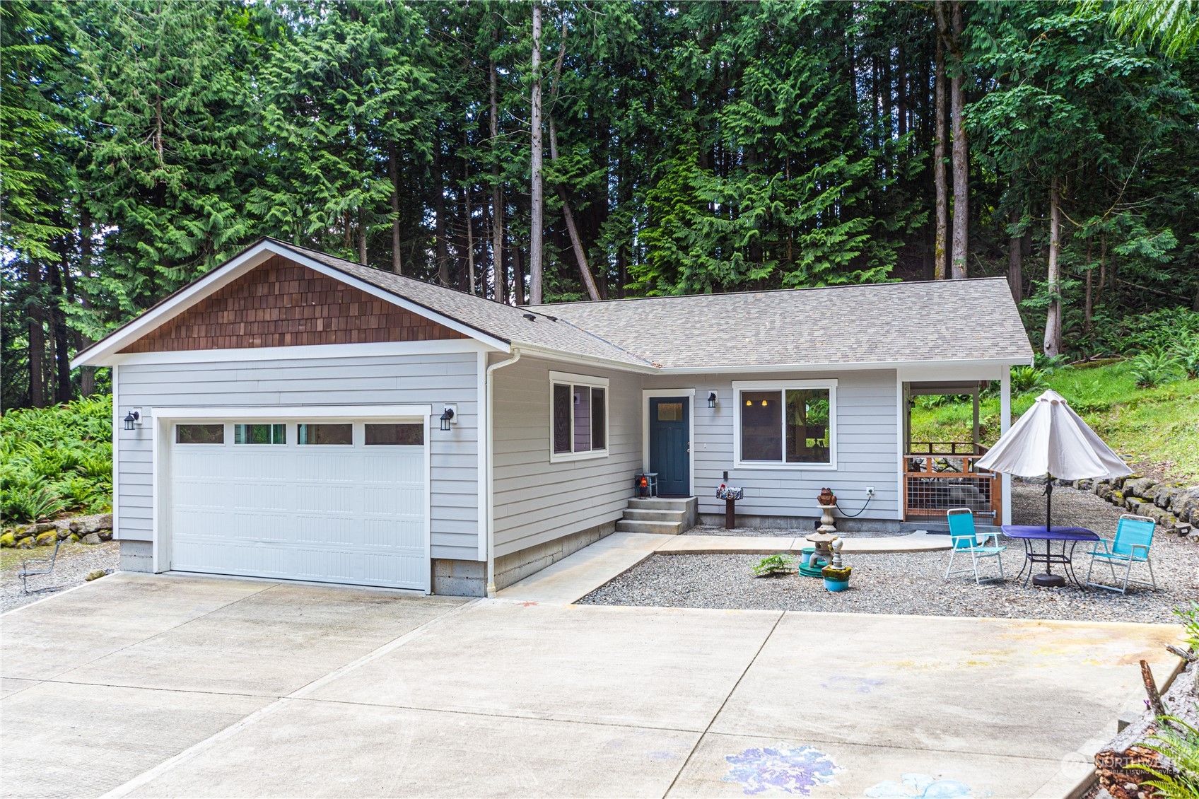 137 Windridge Road Chimacum, WA 98325 - Photo 1 of 40 a front view of house with garage and yard