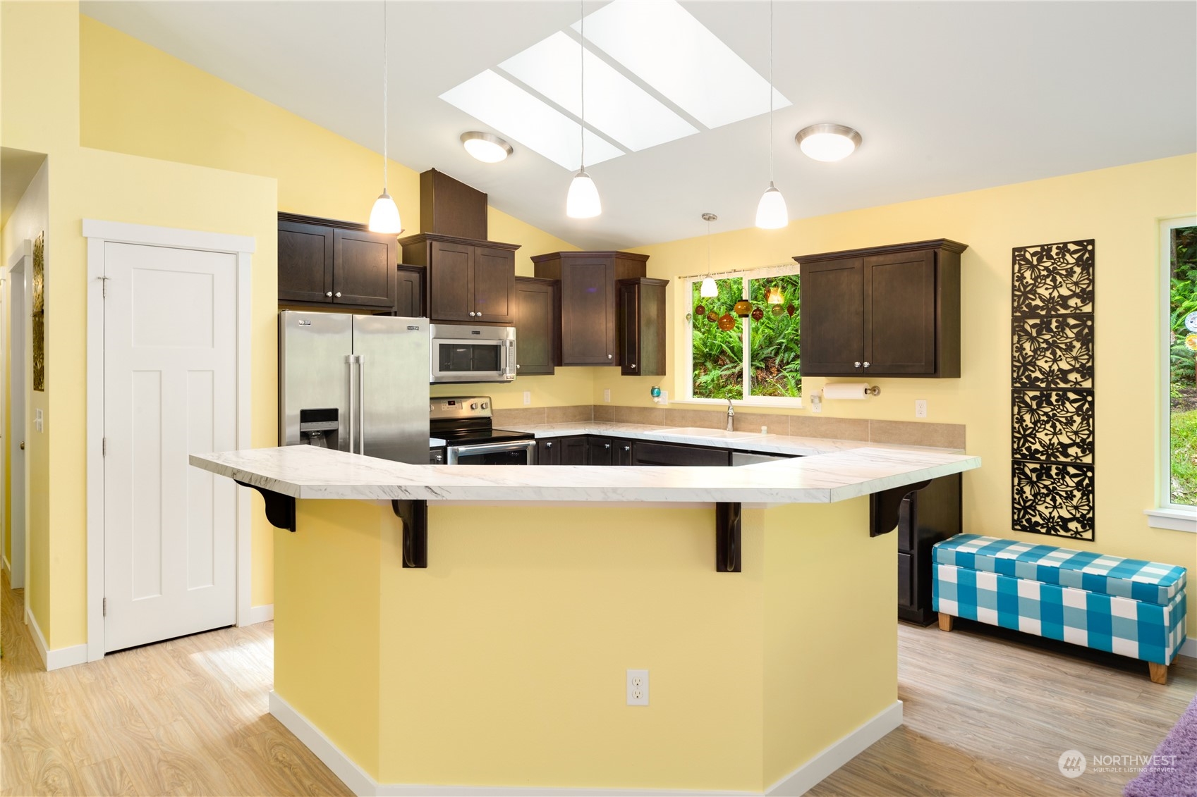 137 Windridge Road Chimacum, WA 98325 - Photo 8 of 40 a kitchen with a sink a counter top space and cabinets