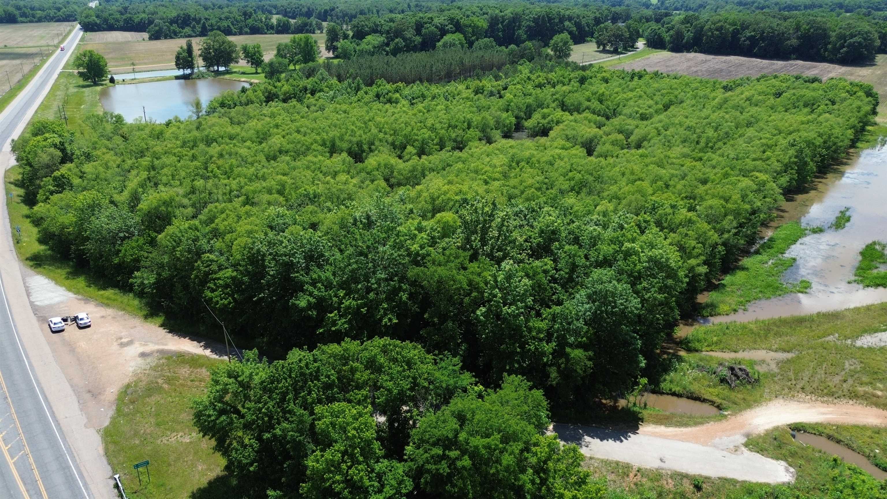 0 Hardin Graveyard Road Morris Chapel, TN 38361 - Photo 1 of 36 an aerial view of a house with a yard