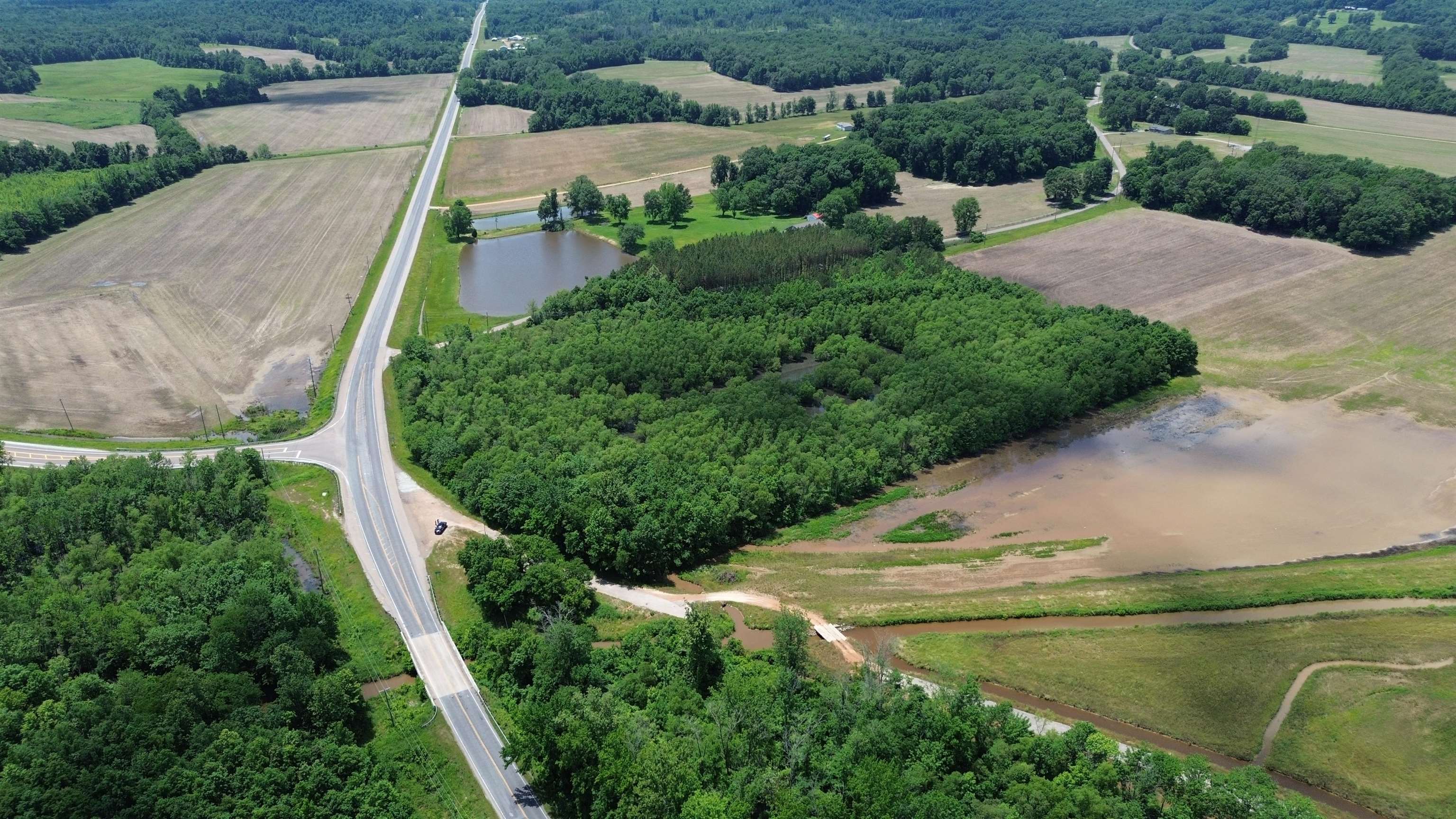 0 Hardin Graveyard Road Morris Chapel, TN 38361 - Photo 17 of 36 an aerial view of a house with a yard and lake view