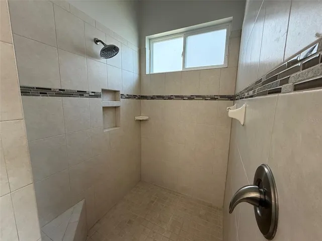 a close view of a shower in the bathroom