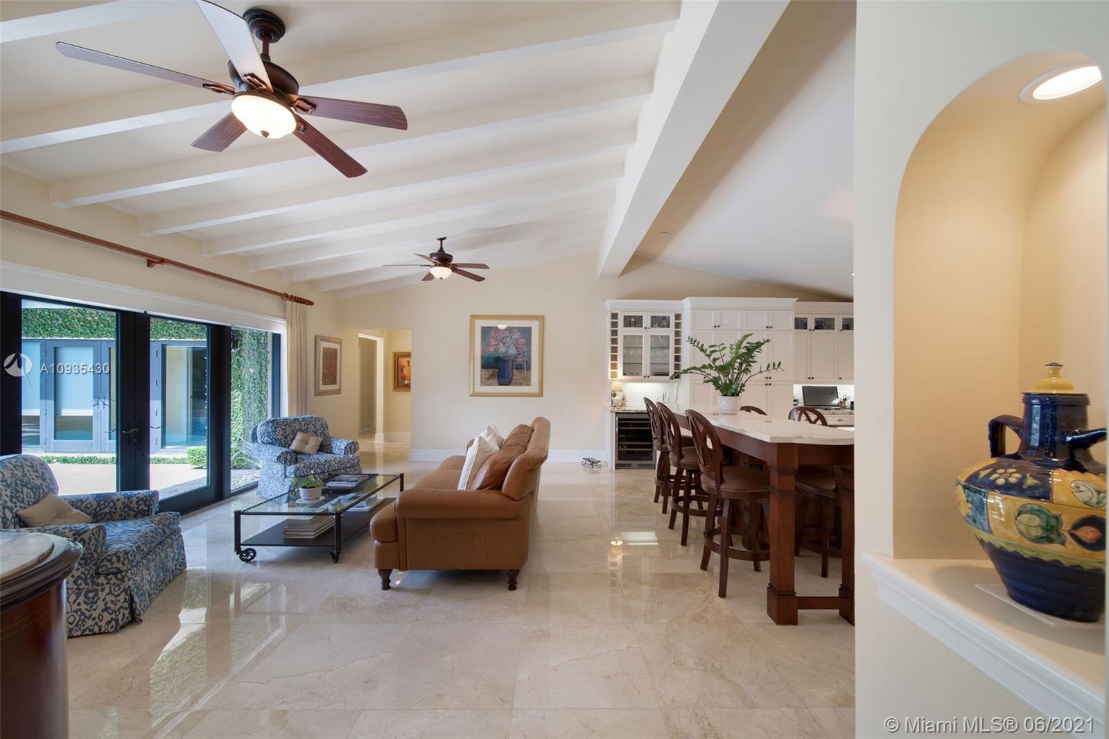 4804 Biltmore Drive Coral Gables, FL 33146 - Photo 12 of 47 a living room with furniture and a large window