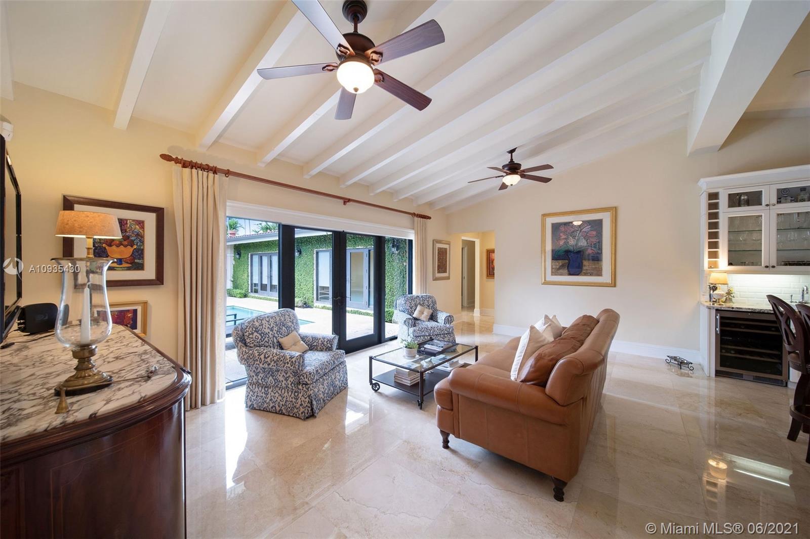 4804 Biltmore Drive Coral Gables, FL 33146 - Photo 13 of 47 a living room with furniture and a ceiling fan