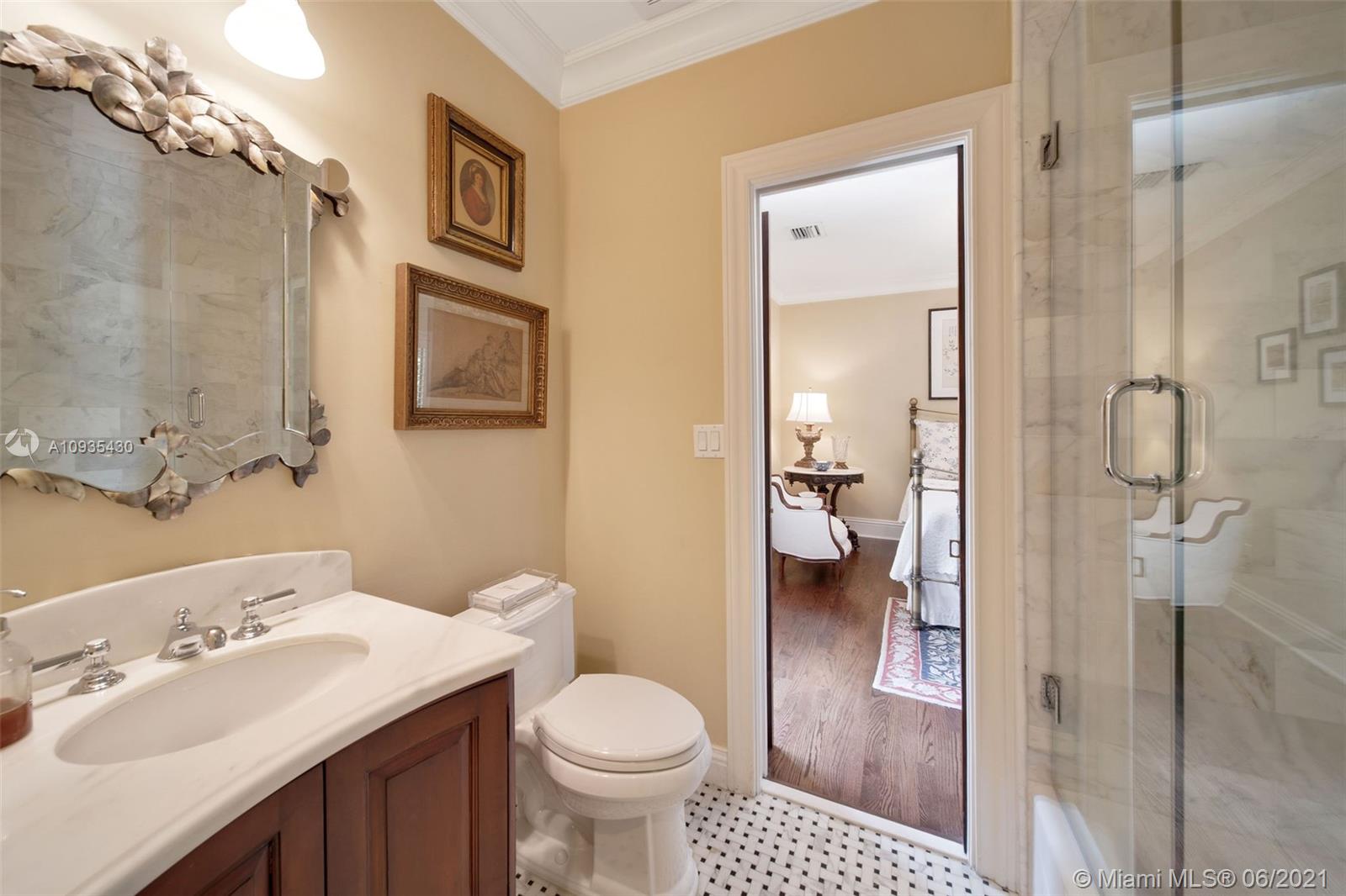 4804 Biltmore Drive Coral Gables, FL 33146 - Photo 18 of 47 a bathroom with a sink toilet and shower